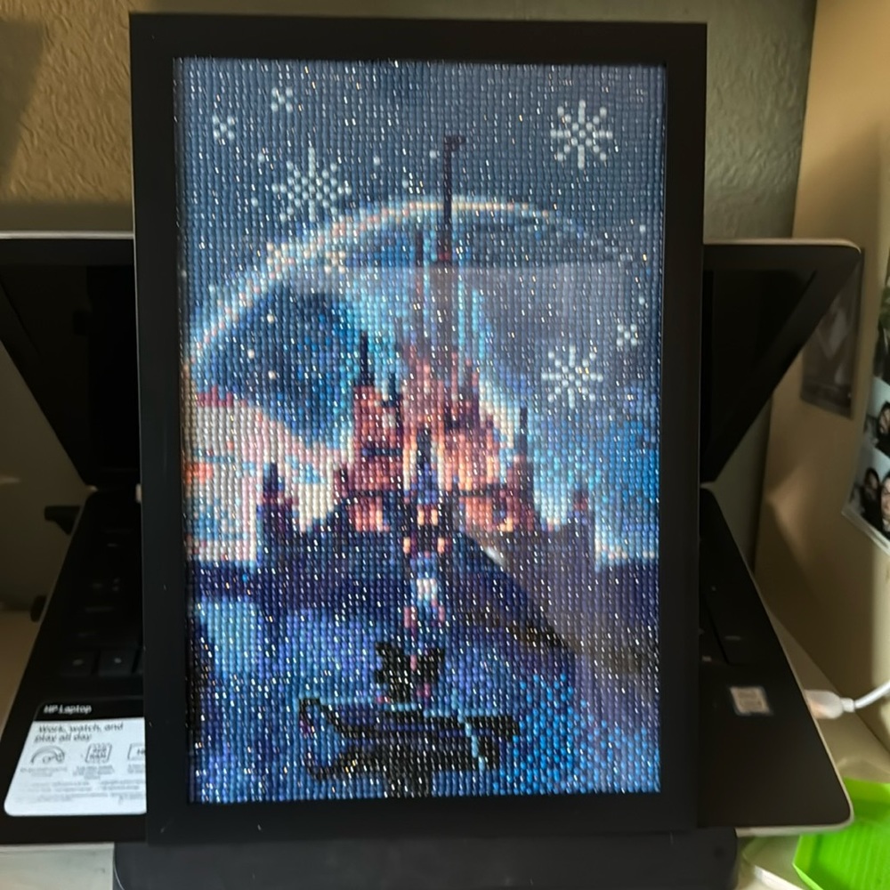 Completed framed diamond art Cinderella’s castle added glue sealant